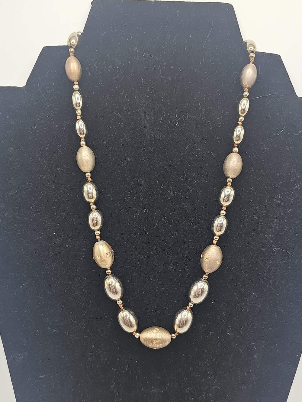 Gold-Tone Beaded Women's Necklace - Elegant Metallic Statement. Tini Rheinstone
